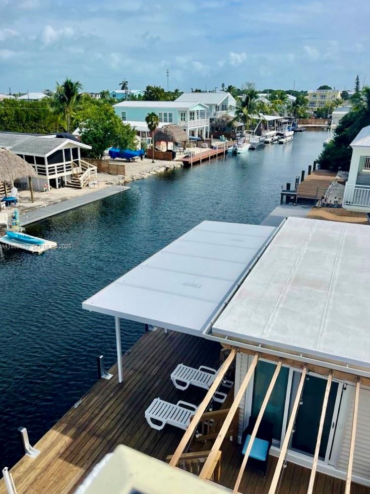 20 Eagle Drive Key Largo, FL 33037 - Photo 55 of 55 a view of a swimming pool with lounge chair