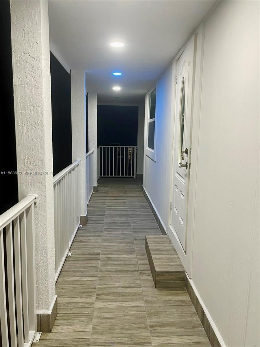 20 Eagle Drive Key Largo, FL 33037 - Photo 8 of 55 a view of a hallway with wooden floor and staircase