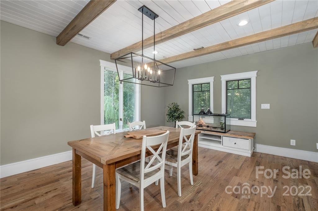 5932 Deal Road Matthews, NC 28104 - Photo 11 of 41 a view of a dining room with furniture window and wooden floor