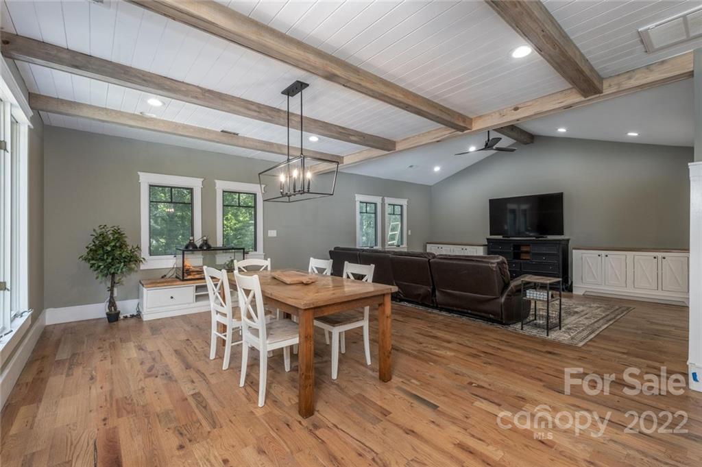 5932 Deal Road Matthews, NC 28104 - Photo 12 of 41 a view of a dining room with furniture window and wooden floor