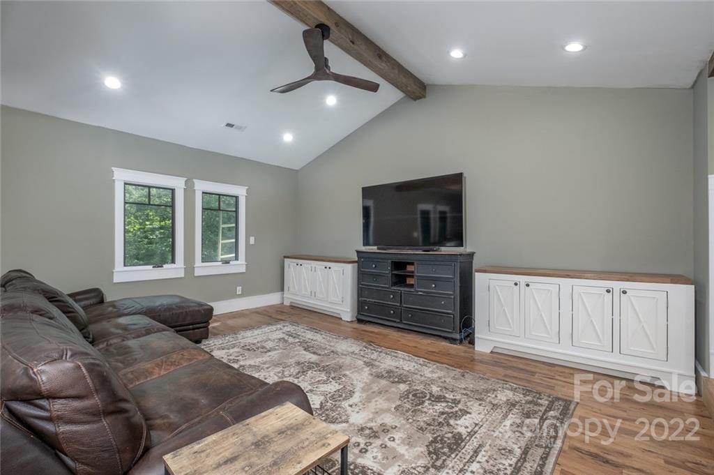 5932 Deal Road Matthews, NC 28104 - Photo 13 of 41 a living room with furniture and a flat screen tv