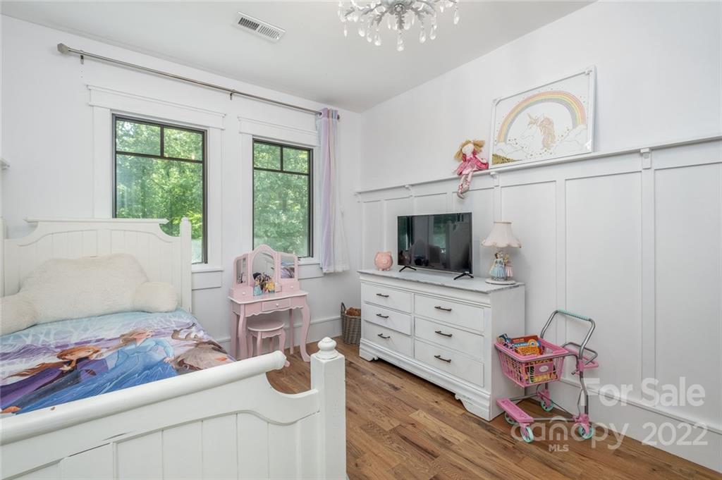 5932 Deal Road Matthews, NC 28104 - Photo 23 of 41 a living room with furniture and a flat screen tv
