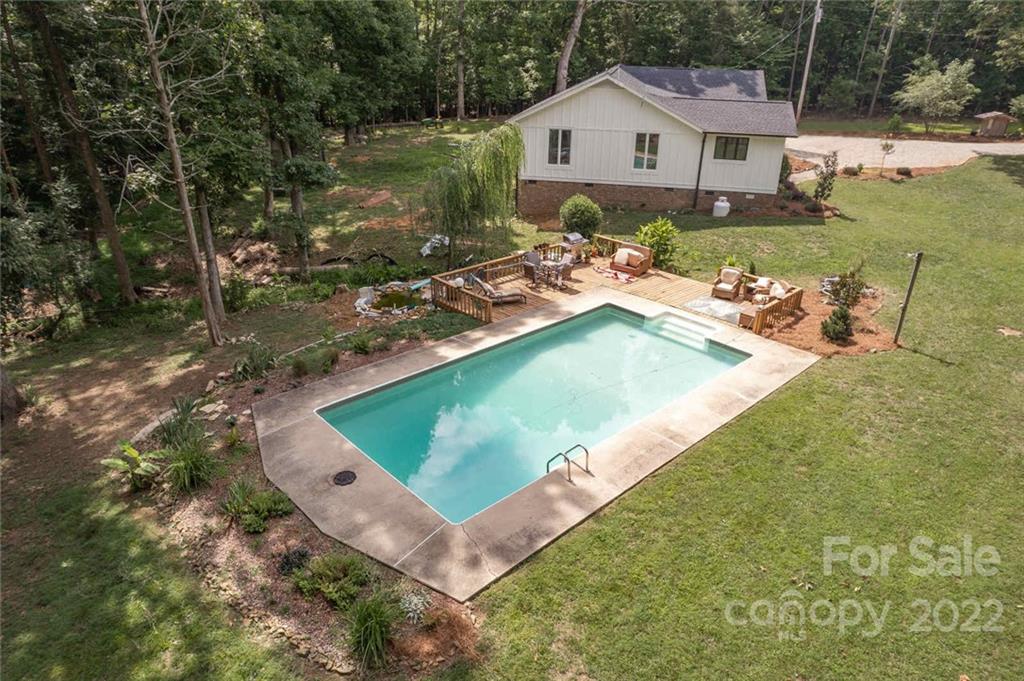 5932 Deal Road Matthews, NC 28104 - Photo 28 of 41 a view of a house with pool