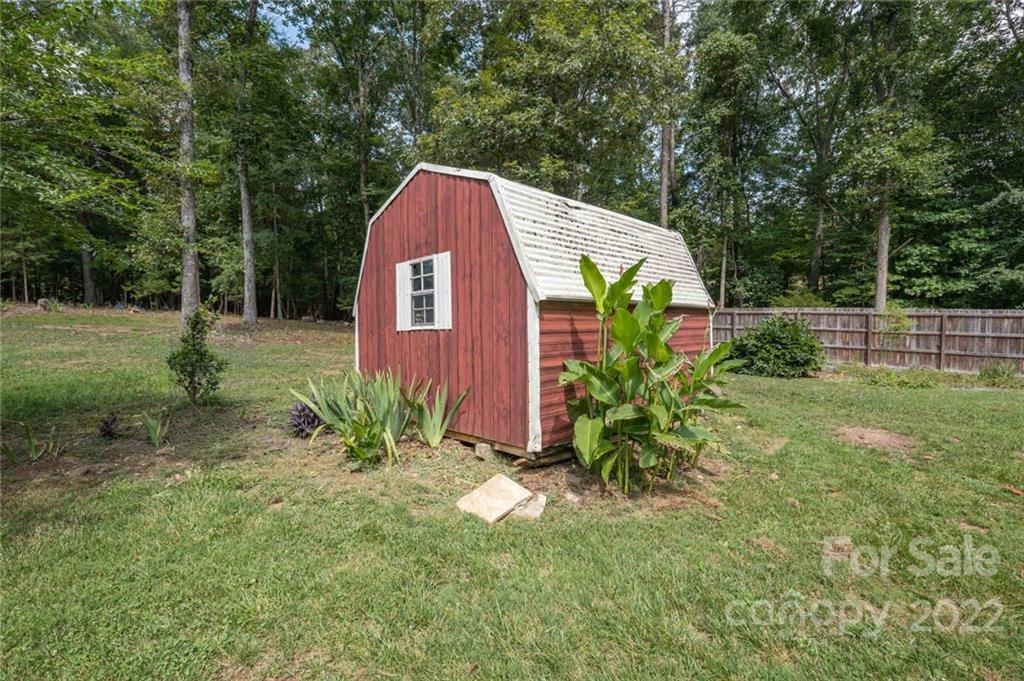 5932 Deal Road Matthews, NC 28104 - Photo 29 of 41 a view of backyard with green space