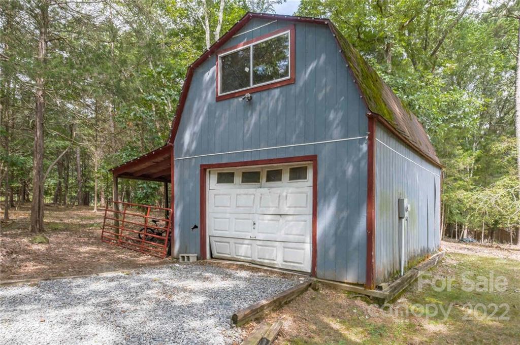 5932 Deal Road Matthews, NC 28104 - Photo 32 of 41 a front view of a house with a yard
