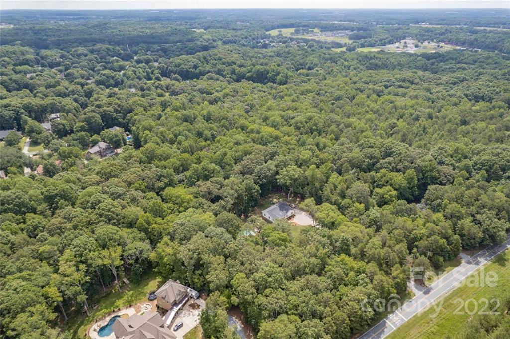 5932 Deal Road Matthews, NC 28104 - Photo 35 of 41 an aerial view of a house with a yard