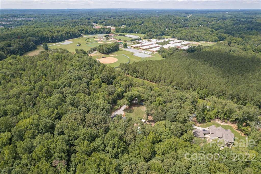 5932 Deal Road Matthews, NC 28104 - Photo 39 of 41 a view of a lake with a city view
