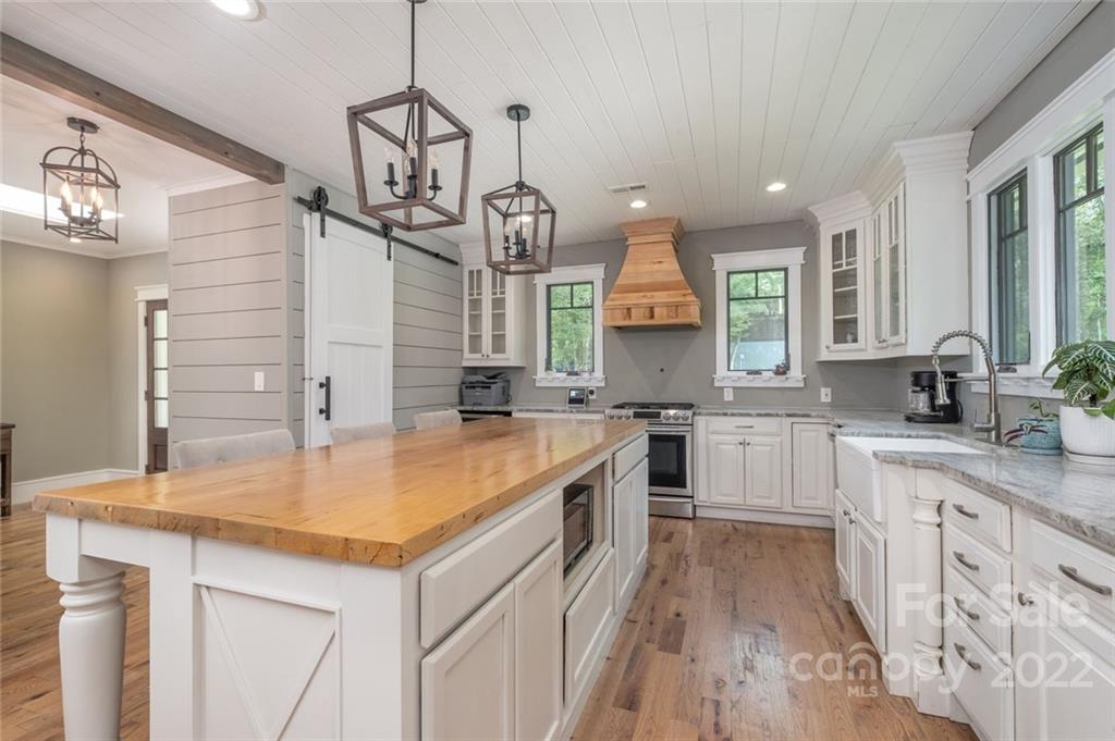 5932 Deal Road Matthews, NC 28104 - Photo 6 of 41 a kitchen with sink cabinets and wooden floor