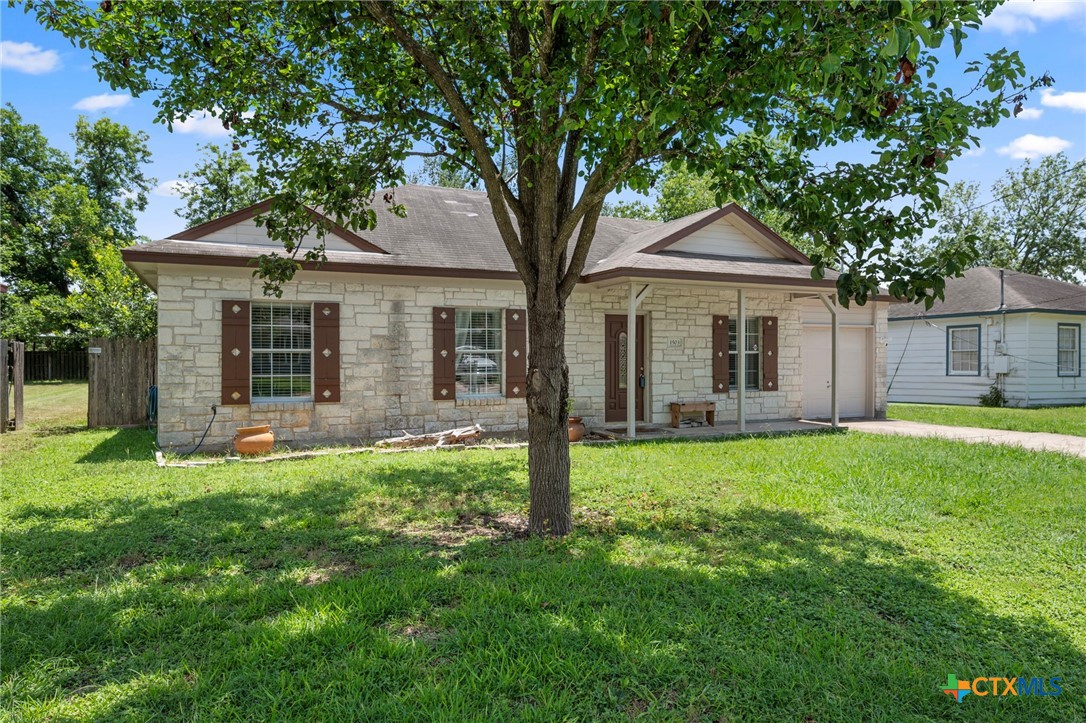 1503 Prather Street Taylor, TX 76574 - Photo 1 of 1 front view of a house with a yard