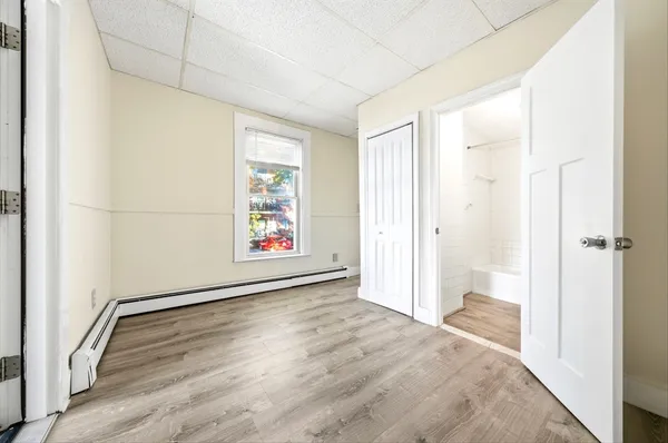a view of an empty room and window
