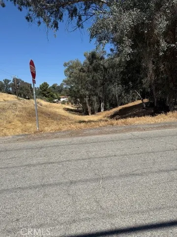 a view of a house with a snow on the road