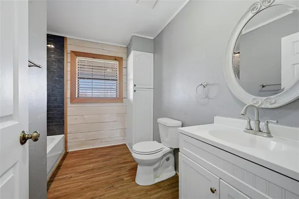 a bathroom with a sink and a shower