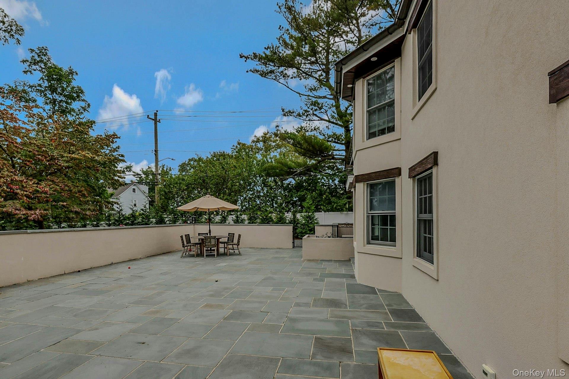 236 Berry Hill Road Syosset, NY 11791 - Photo 24 of 27 View of patio / terrace featuring outdoor dining area