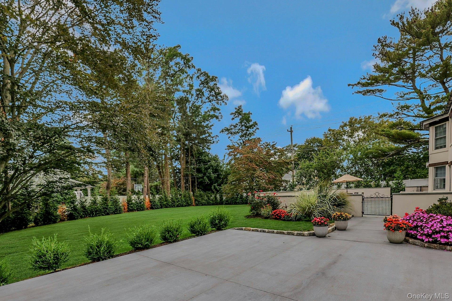 236 Berry Hill Road Syosset, NY 11791 - Photo 25 of 27 View of patio / terrace with a gate