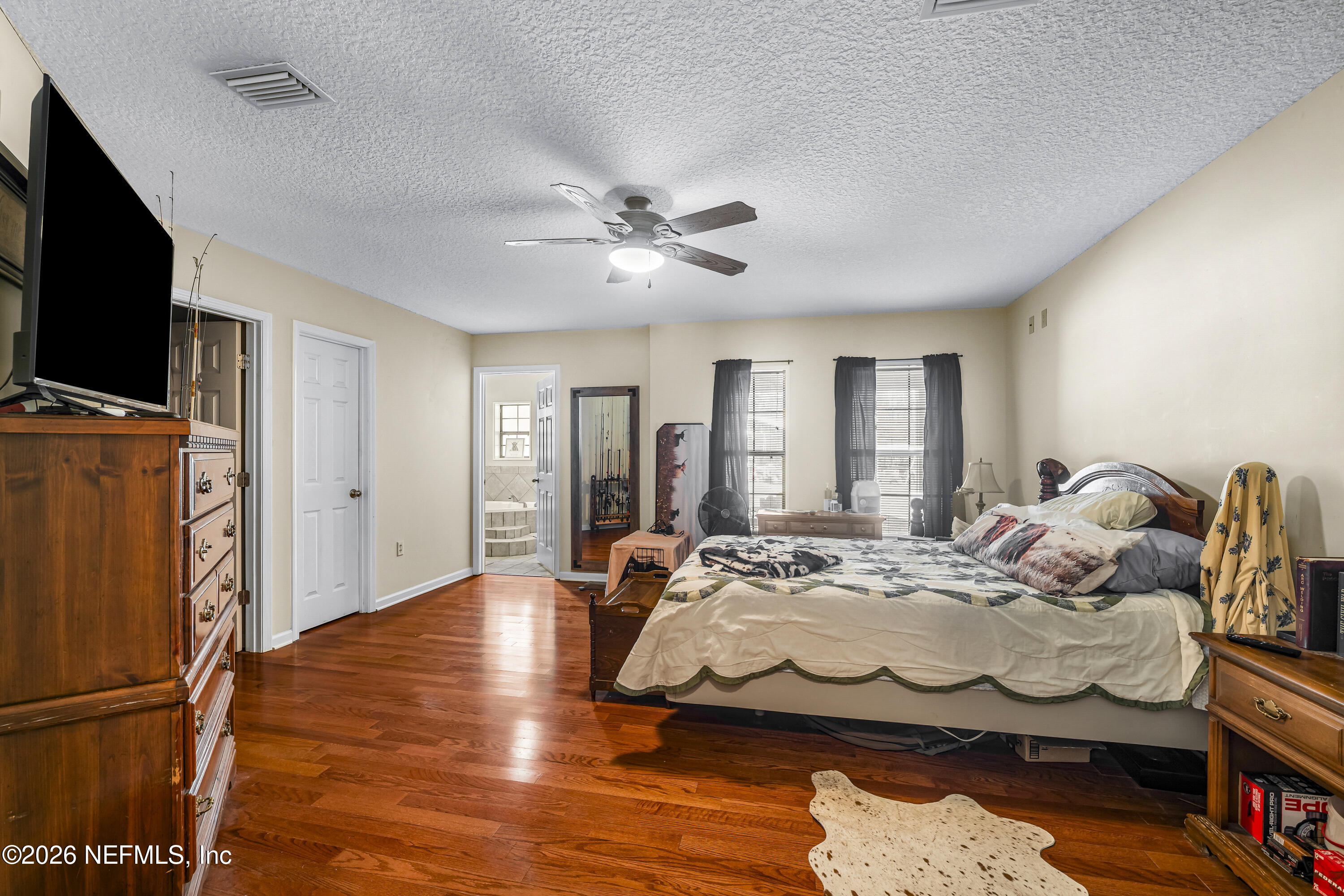 1725 Davidson Farm Road Jacksonville, FL 32218 - Photo 32 of 53 a bedroom with bed and window