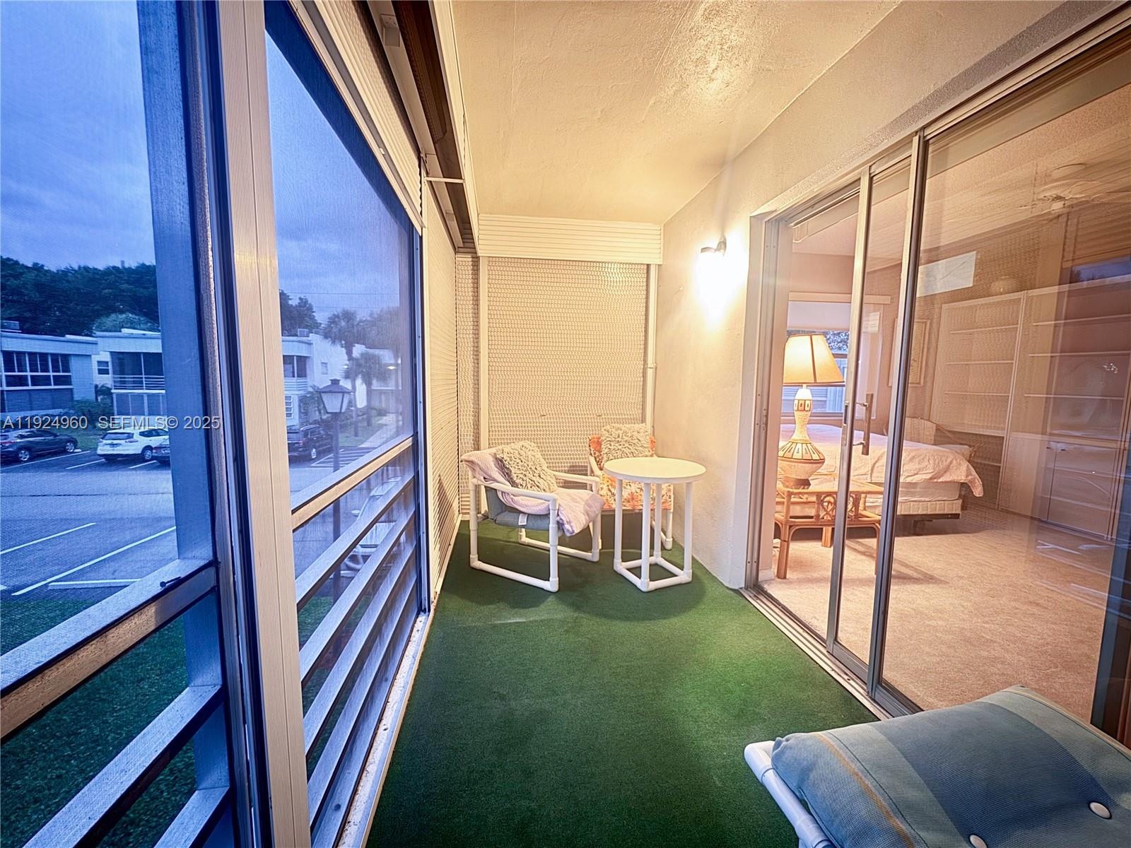 612 Normandy Lane, Unit 612 Delray Beach, FL 33484 - Photo 10 of 18 a view of an outdoor space with seating area