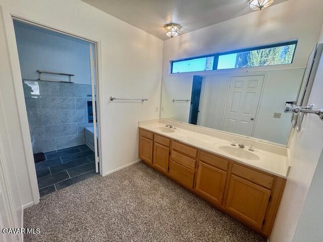 44128 Fine Circle Lancaster, CA 93536 - Photo 37 of 63 a spacious bathroom with a double vanity sink a large mirror and shower