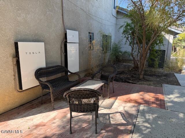 44128 Fine Circle Lancaster, CA 93536 - Photo 61 of 63 a view of a chairs and table in a backyard