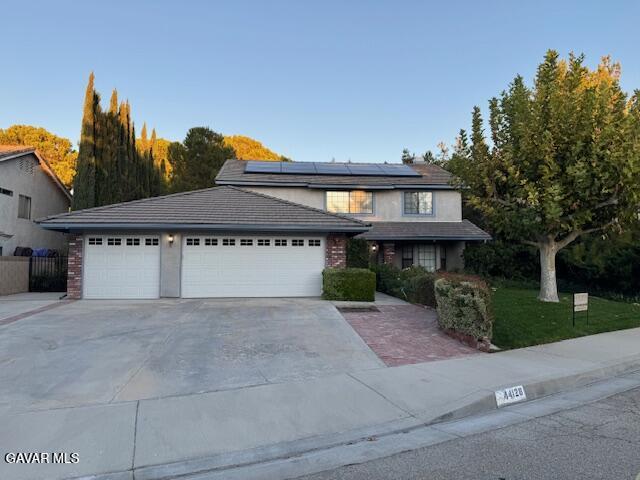 44128 Fine Circle Lancaster, CA 93536 - Photo 62 of 63 a view of a house with a yard and potted plants