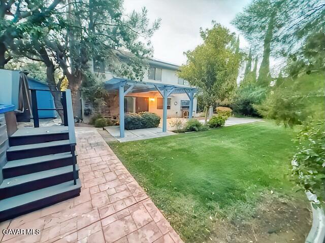 44128 Fine Circle Lancaster, CA 93536 - Photo 63 of 63 a front view of a house with garden