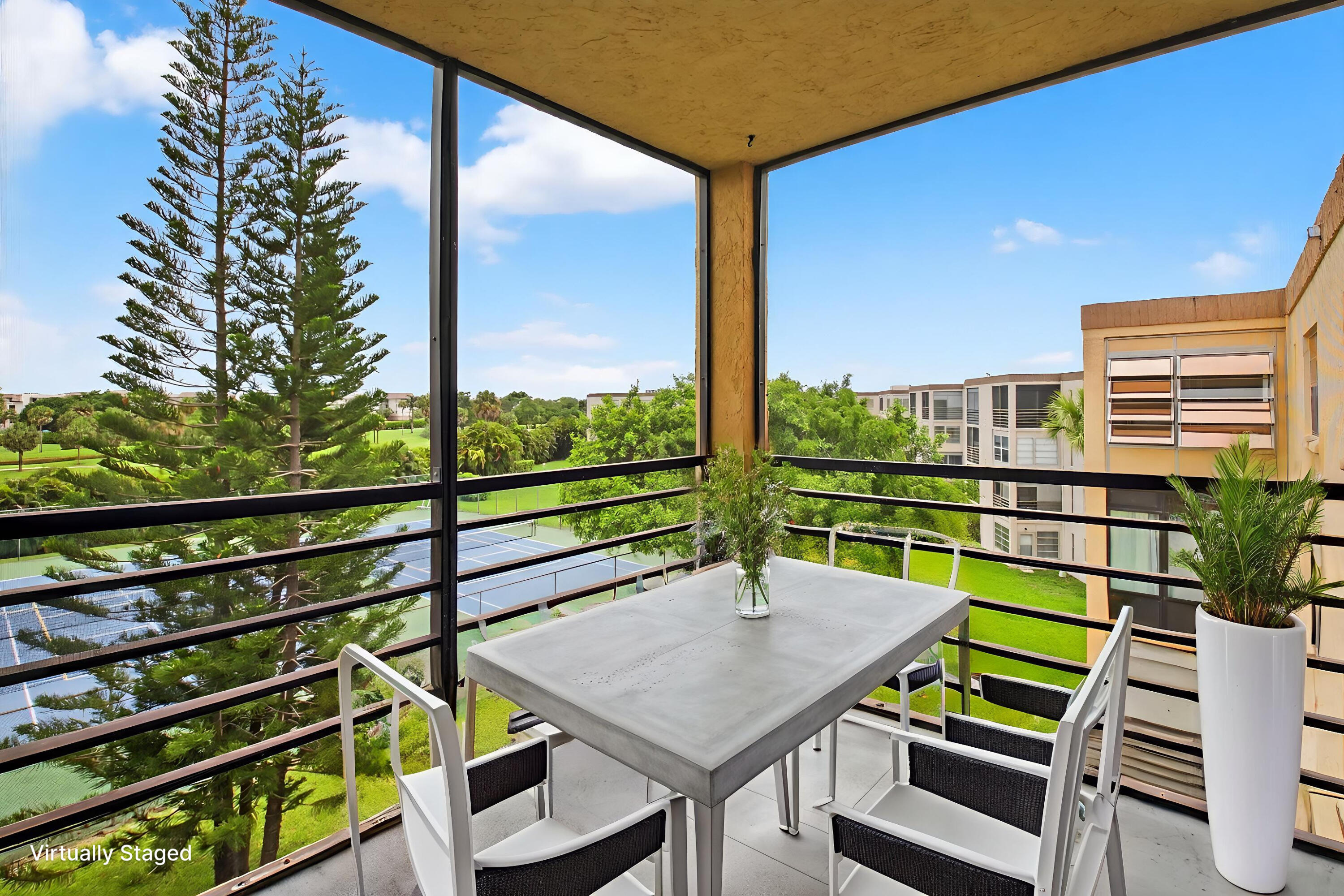 9370 Southwest 8th Street, Unit 410 Boca Raton, FL 33428 - Photo 22 of 28 Virtually Staged Balcony