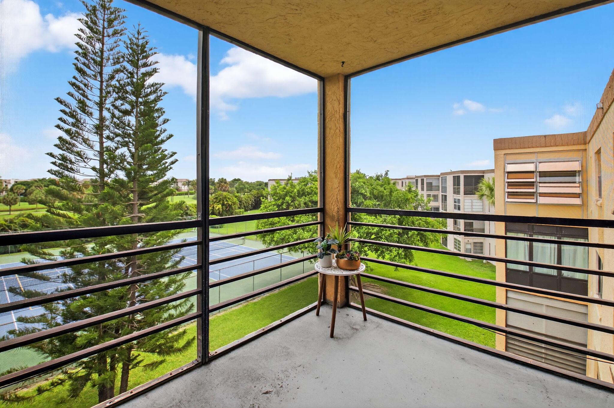 9370 Southwest 8th Street, Unit 410 Boca Raton, FL 33428 - Photo 23 of 28 Screened Balcony