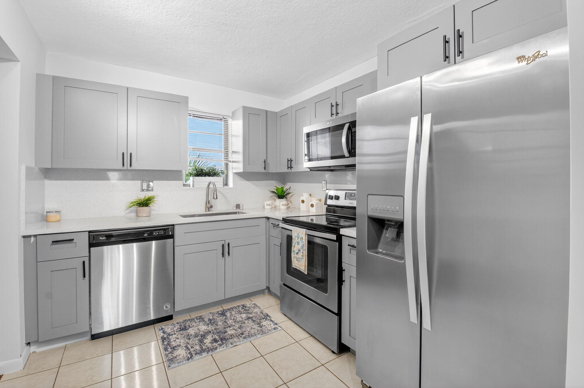 9370 Southwest 8th Street, Unit 410 Boca Raton, FL 33428 - Photo 5 of 28 Renovated Kitchen