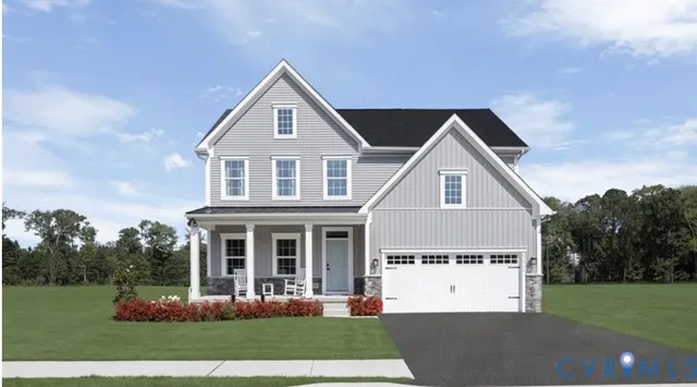 a view of a white house with a yard and plants