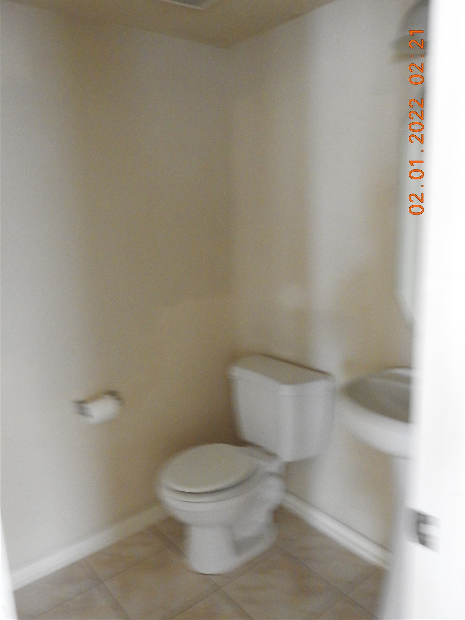 24227 Silversmith Lane Katy, TX 77493 - Photo 31 of 42 a white toilet sitting next to a white sink