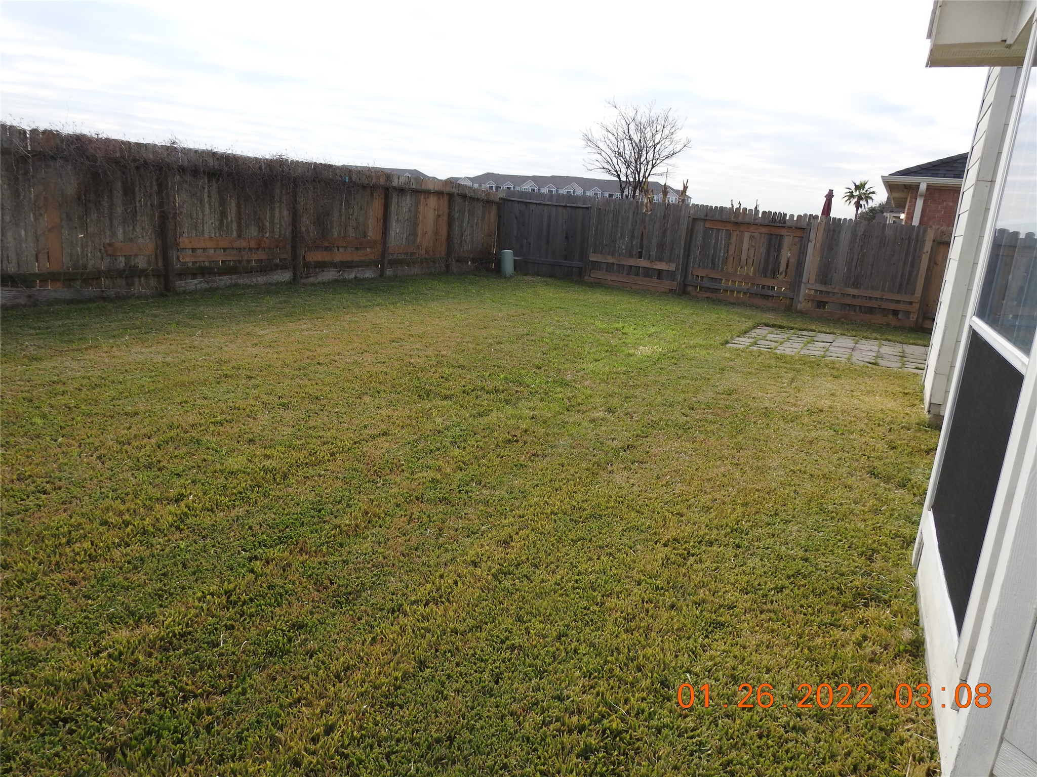 24227 Silversmith Lane Katy, TX 77493 - Photo 41 of 42 a view of a backyard with wooden fence