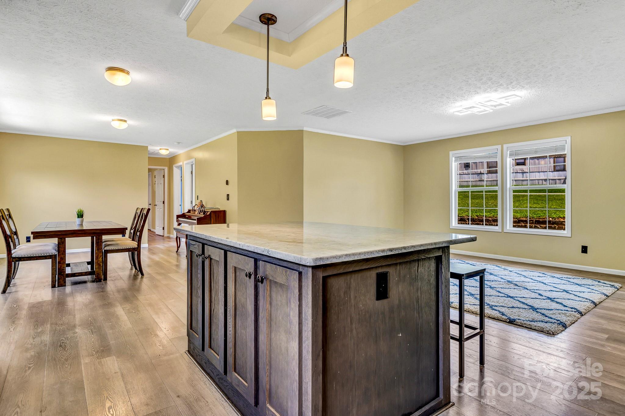 185 Bradshaw Circle Candler, NC 28715 - Photo 11 of 38 a kitchen with stainless steel appliances granite countertop a stove a sink and a refrigerator