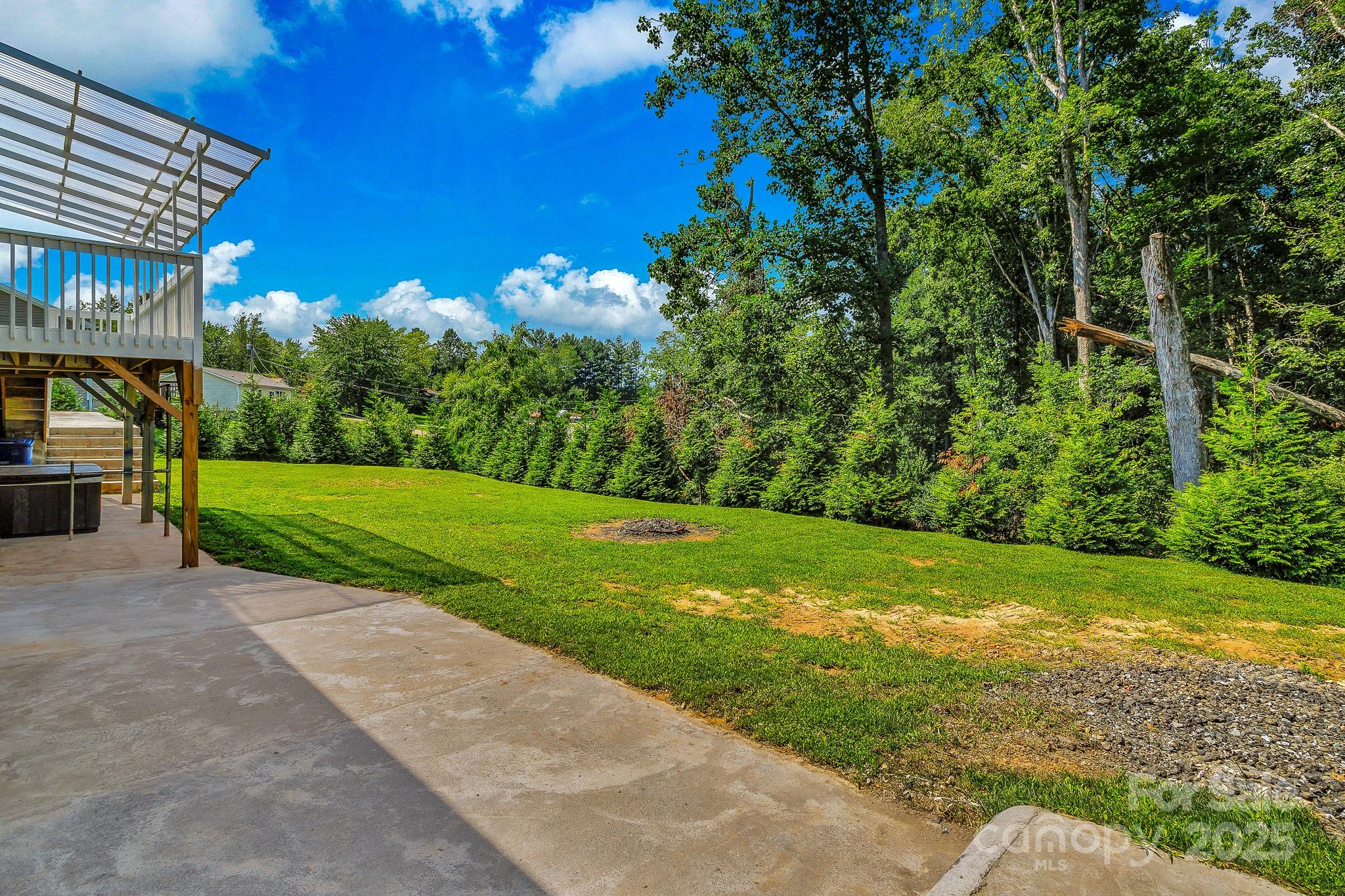 185 Bradshaw Circle Candler, NC 28715 - Photo 36 of 38 a view of a house with a big yard