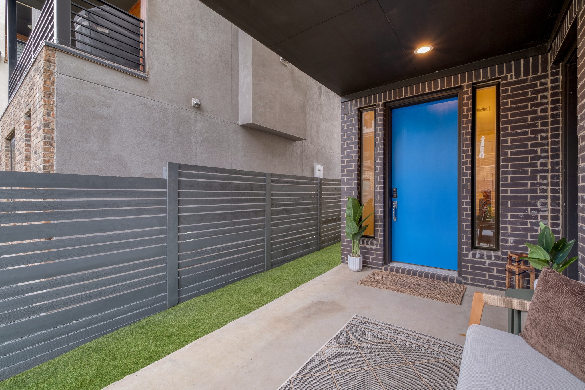 5002 Pecan Springs Road, Unit 7 Austin, TX 78723 - Photo 4 of 34 High-quality materials and a modern door create a solid first impression as you approach the main entrance
