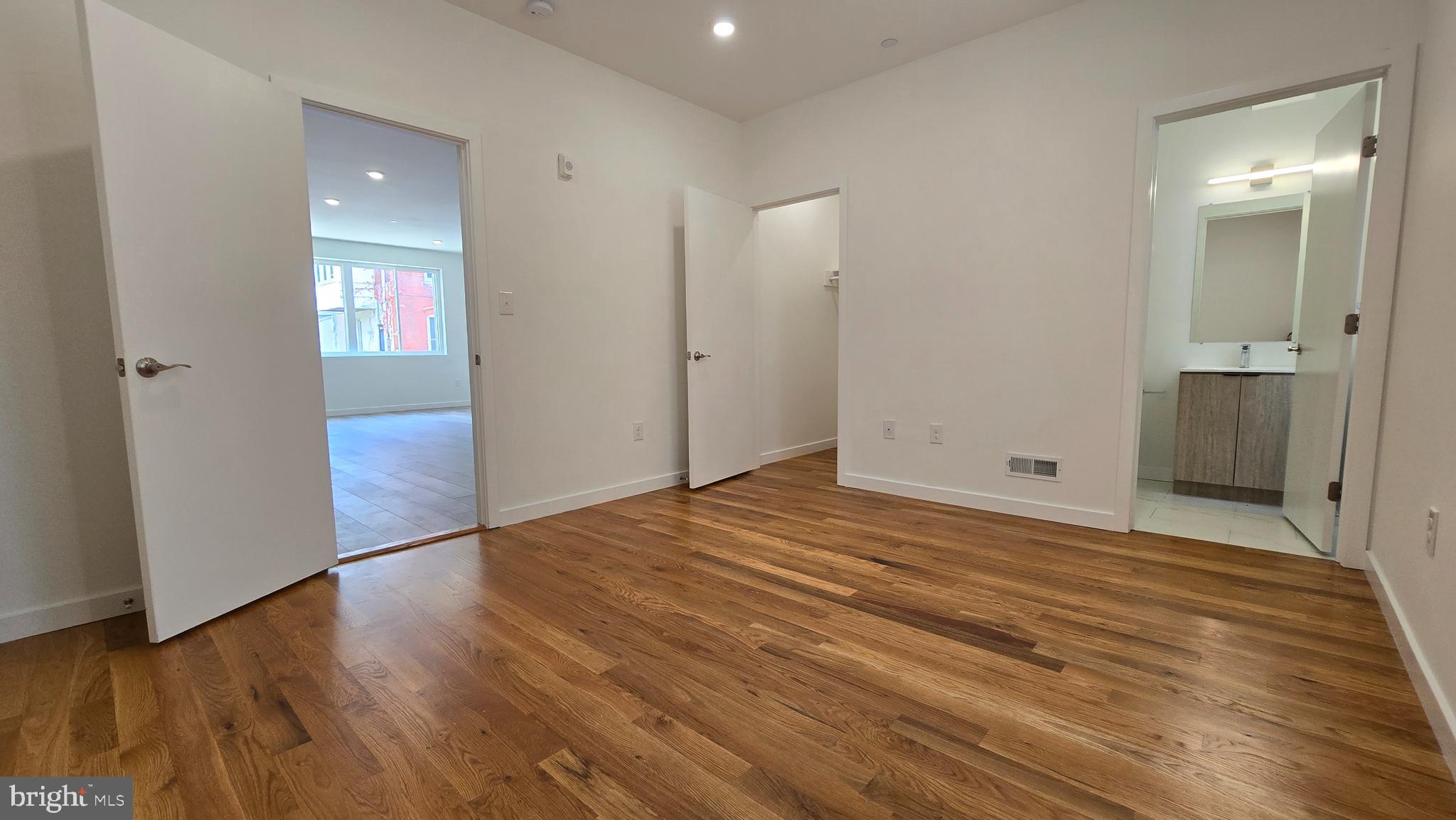 300 Budd Street, Unit C1 Philadelphia, PA 19104 - Photo 3 of 20 a view of empty room with wooden floor