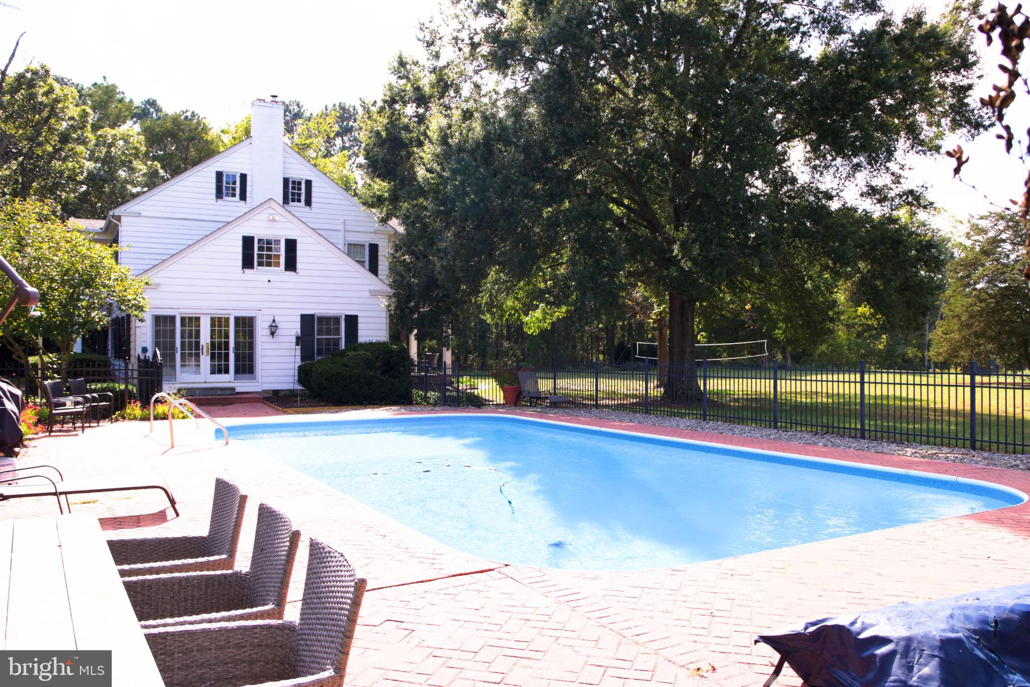 24800 Pealiquor Road Denton, MD 21629 - Photo 33 of 114 a front view of a house with swimming pool