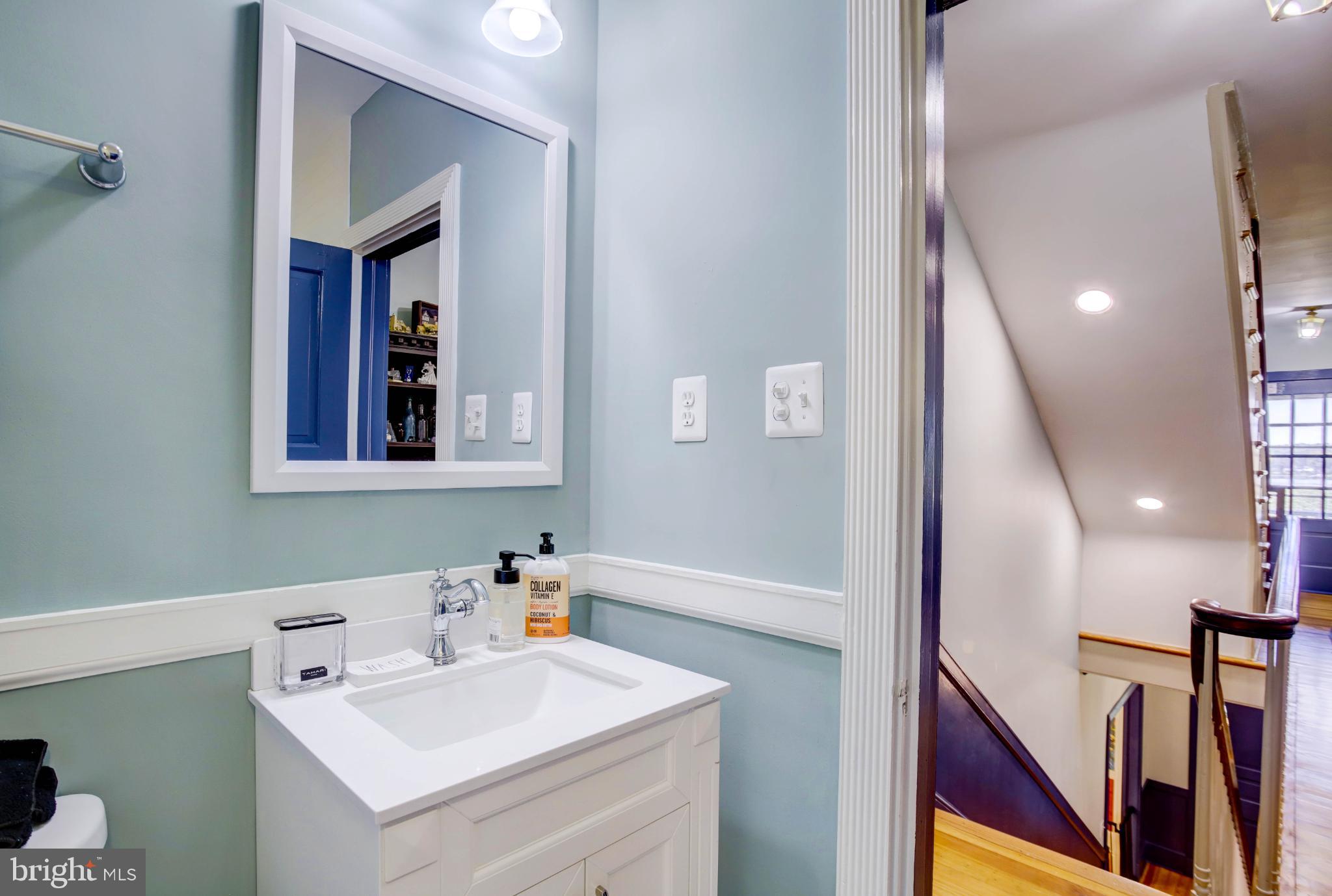 24800 Pealiquor Road Denton, MD 21629 - Photo 65 of 114 a bathroom with a sink a mirror and a shower