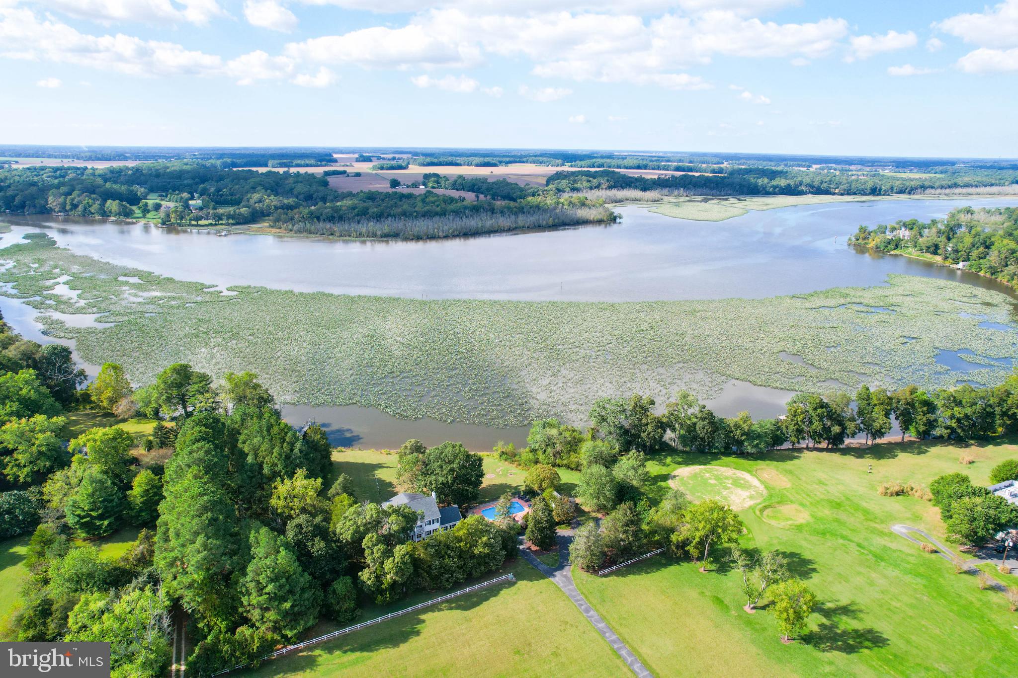 24800 Pealiquor Road Denton, MD 21629 - Photo 7 of 114 a view of a lake with a city view