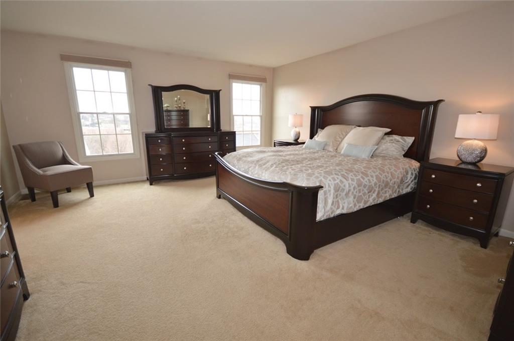62 Castle View Drive McKees Rocks, PA 15136 - Photo 12 of 22 Master Bedroom - 17' x 16' - Enjoy the over-sized master bedroom with plush neutral carpet, neutral walls and access to the master bathroom and large custom closets. There are Graber installed cellular blinds through out this home with room darkening blinds in this room.