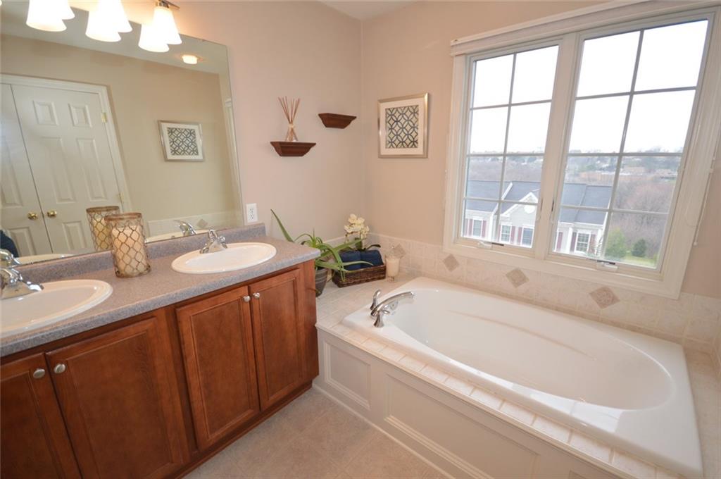 62 Castle View Drive McKees Rocks, PA 15136 - Photo 14 of 22 Master bathroom - Enjoy the privacy of the master bathroom and the double bowl sink and updated vanity area.