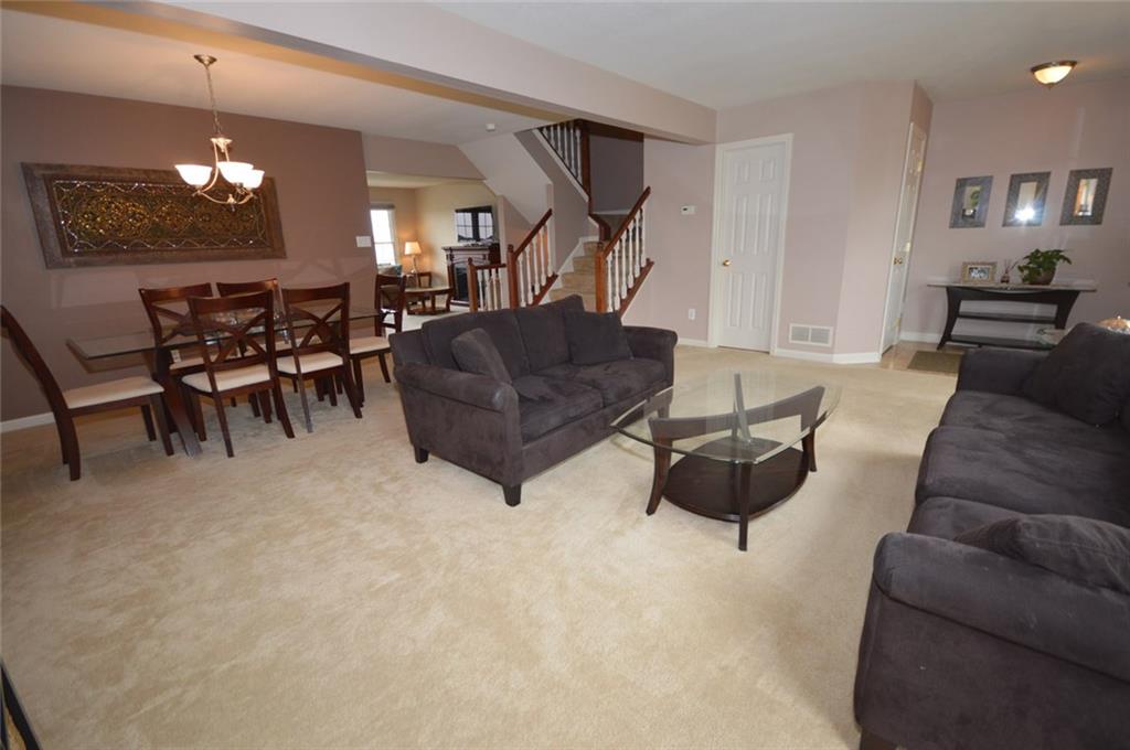62 Castle View Drive McKees Rocks, PA 15136 - Photo 4 of 22 Living room - 19' x 10' and Dining Room - 12' x 10' combination with access to the second floor and first floor 1/2 bath and coat closet. Enjoy your family gatherings here during this Spring season.