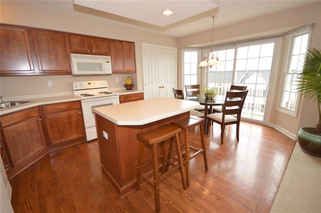 62 Castle View Drive McKees Rocks, PA 15136 - Photo 9 of 22 Kitchen - 23' x 15'. What a kitchen! So much space and room! Enjoy cooking in your updated kitchen with extra seating area at the island or at the side bump-out area. The walls of windows is another added feature in this over-sized kitchen which allows the home owner to enjoy entertaining family and friends.