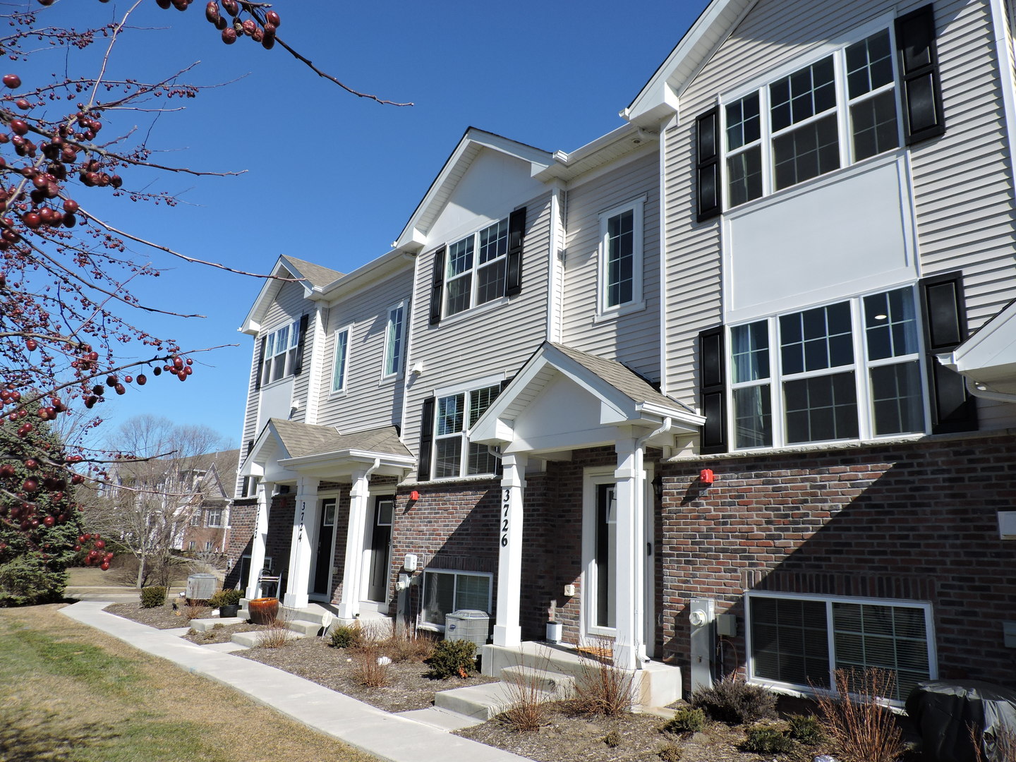 a front view of a house with parking