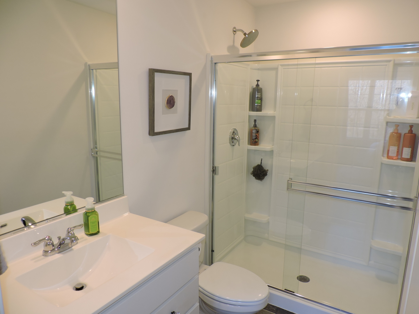 3726 Bailey Road Yorkville, IL 60560 - Photo 12 of 21 a bathroom with a sink and a mirror