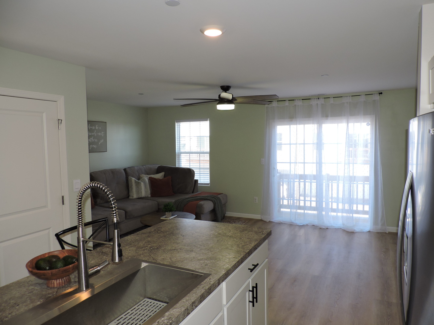 3726 Bailey Road Yorkville, IL 60560 - Photo 7 of 21 a living room with furniture and a window
