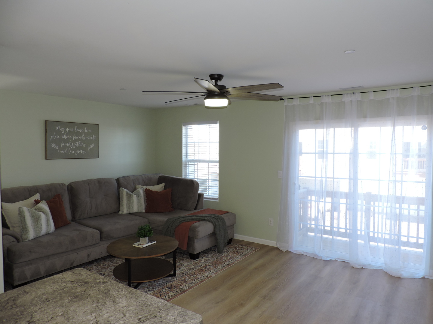 3726 Bailey Road Yorkville, IL 60560 - Photo 9 of 21 a living room with furniture and a large window