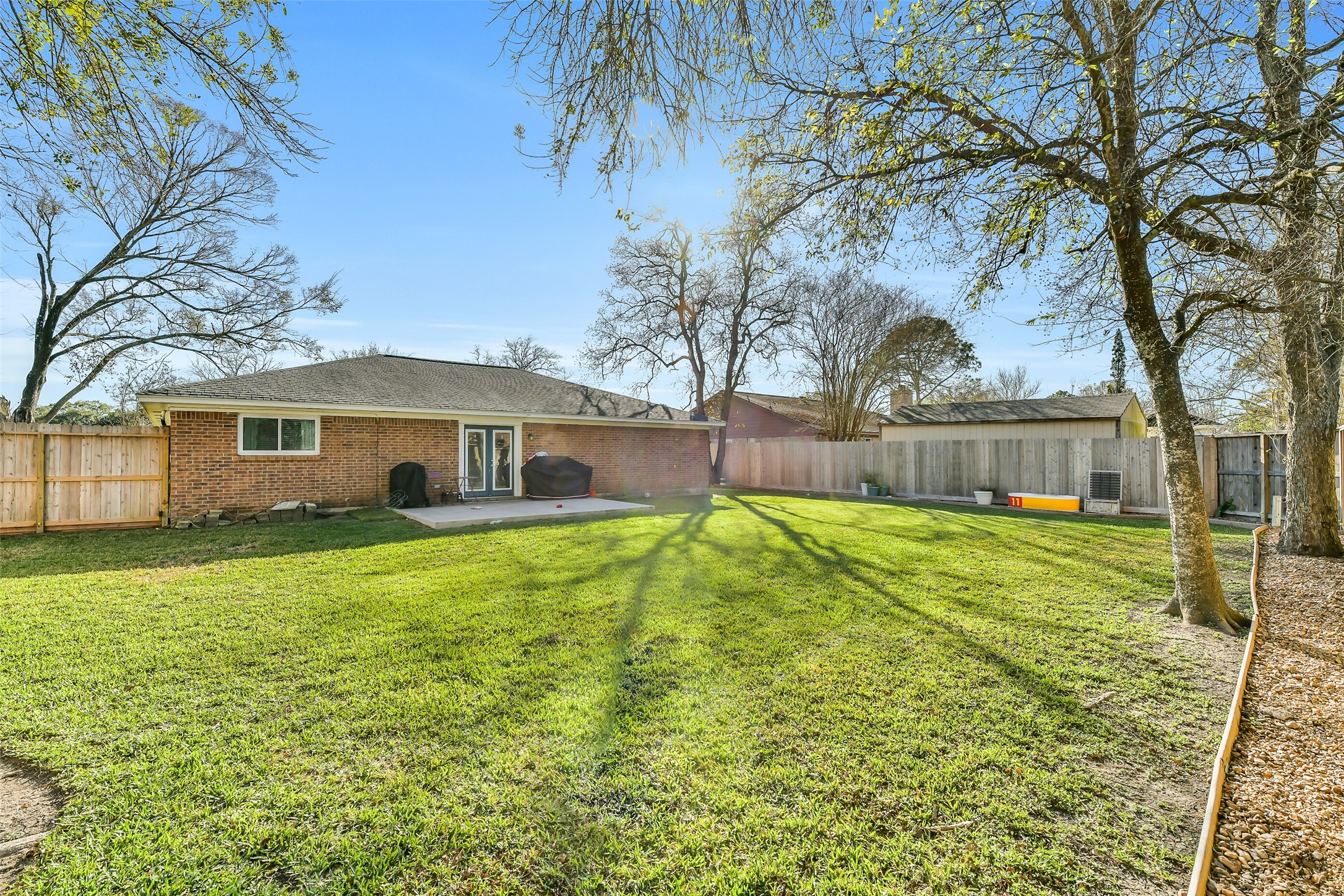 5421 Bramble Lane Dickinson, TX 77539 - Photo 25 of 26 a front view of a house with garden