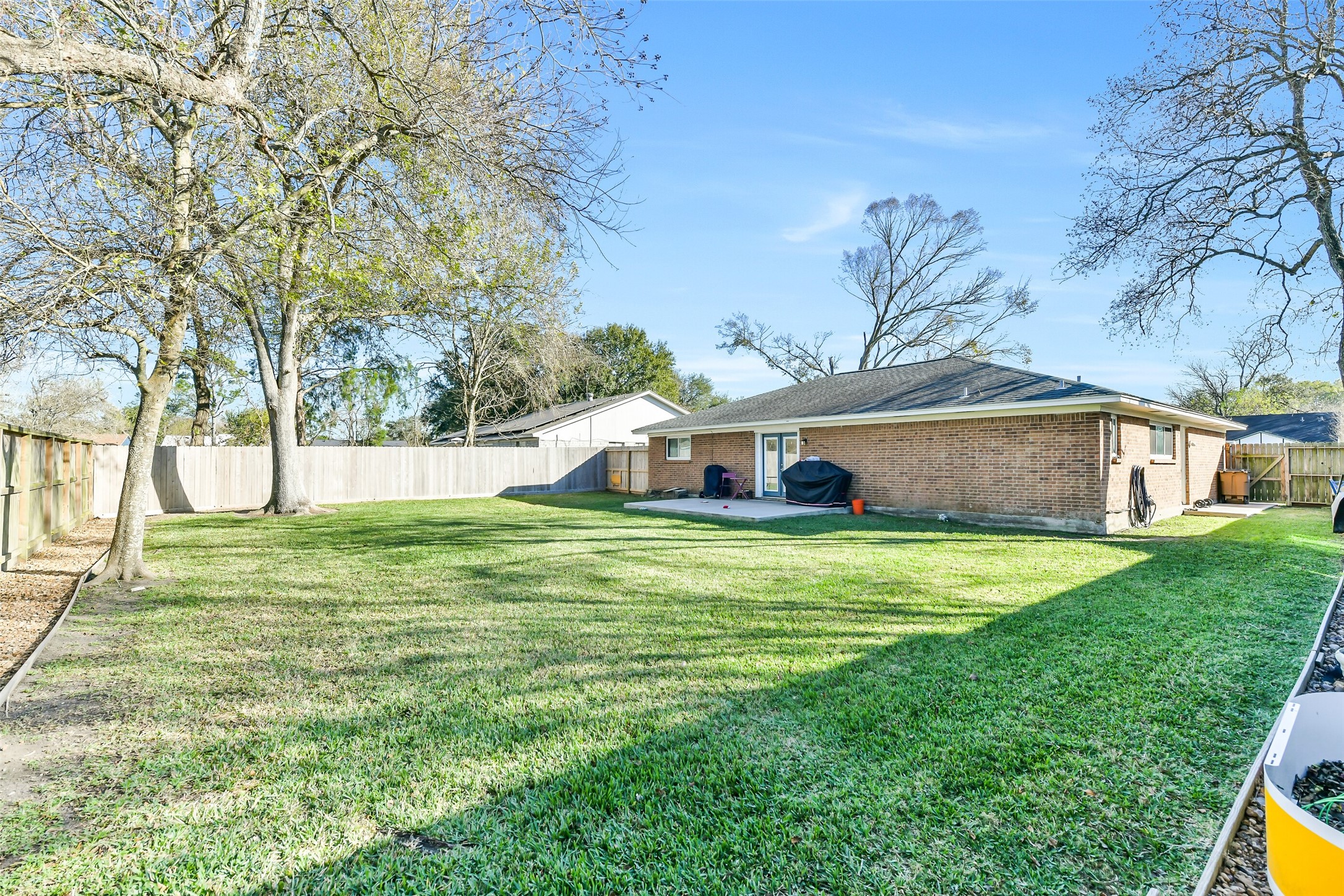 5421 Bramble Lane Dickinson, TX 77539 - Photo 26 of 26 a front view of house with yard and seating area