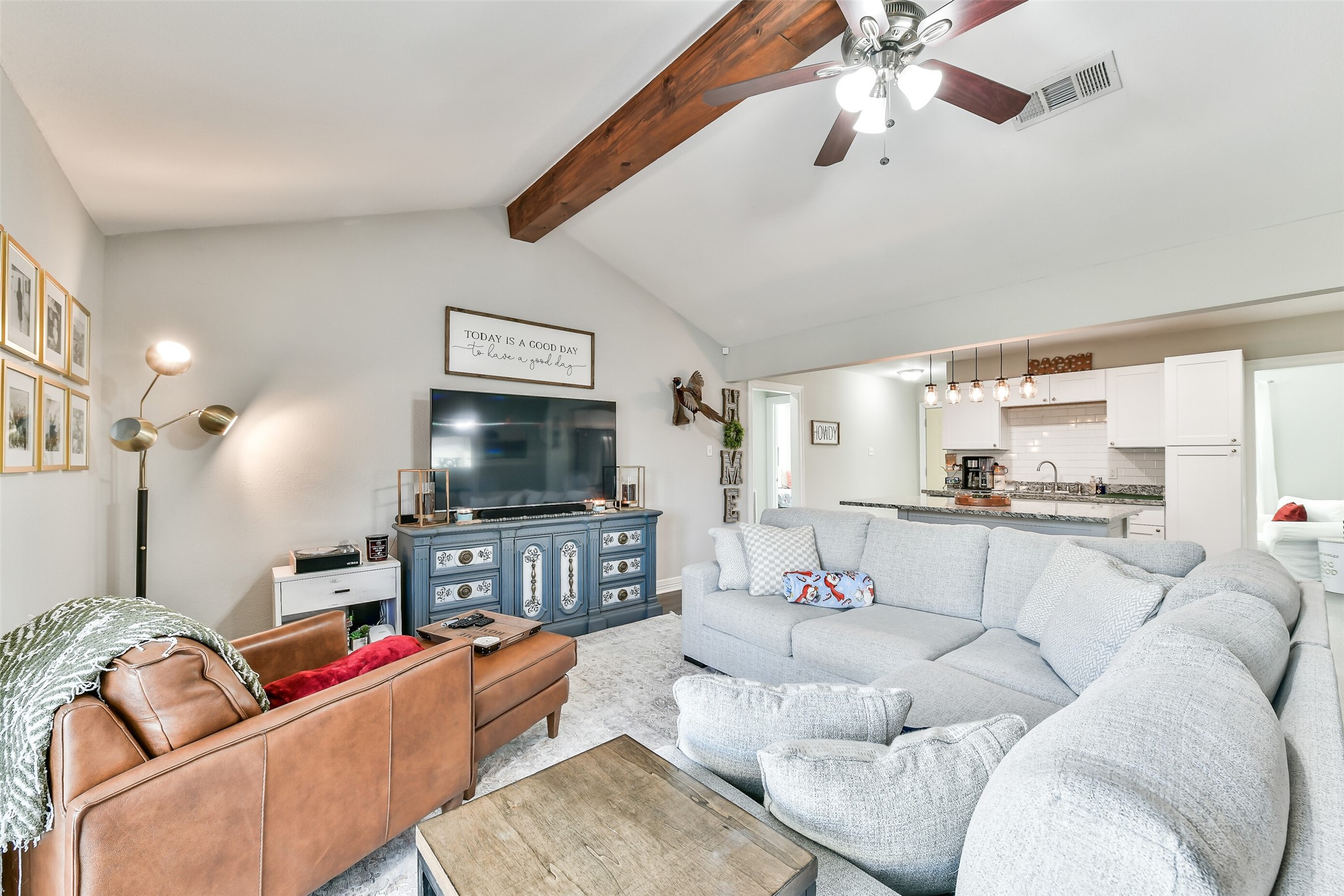 5421 Bramble Lane Dickinson, TX 77539 - Photo 5 of 26 a living room with furniture and a flat screen tv