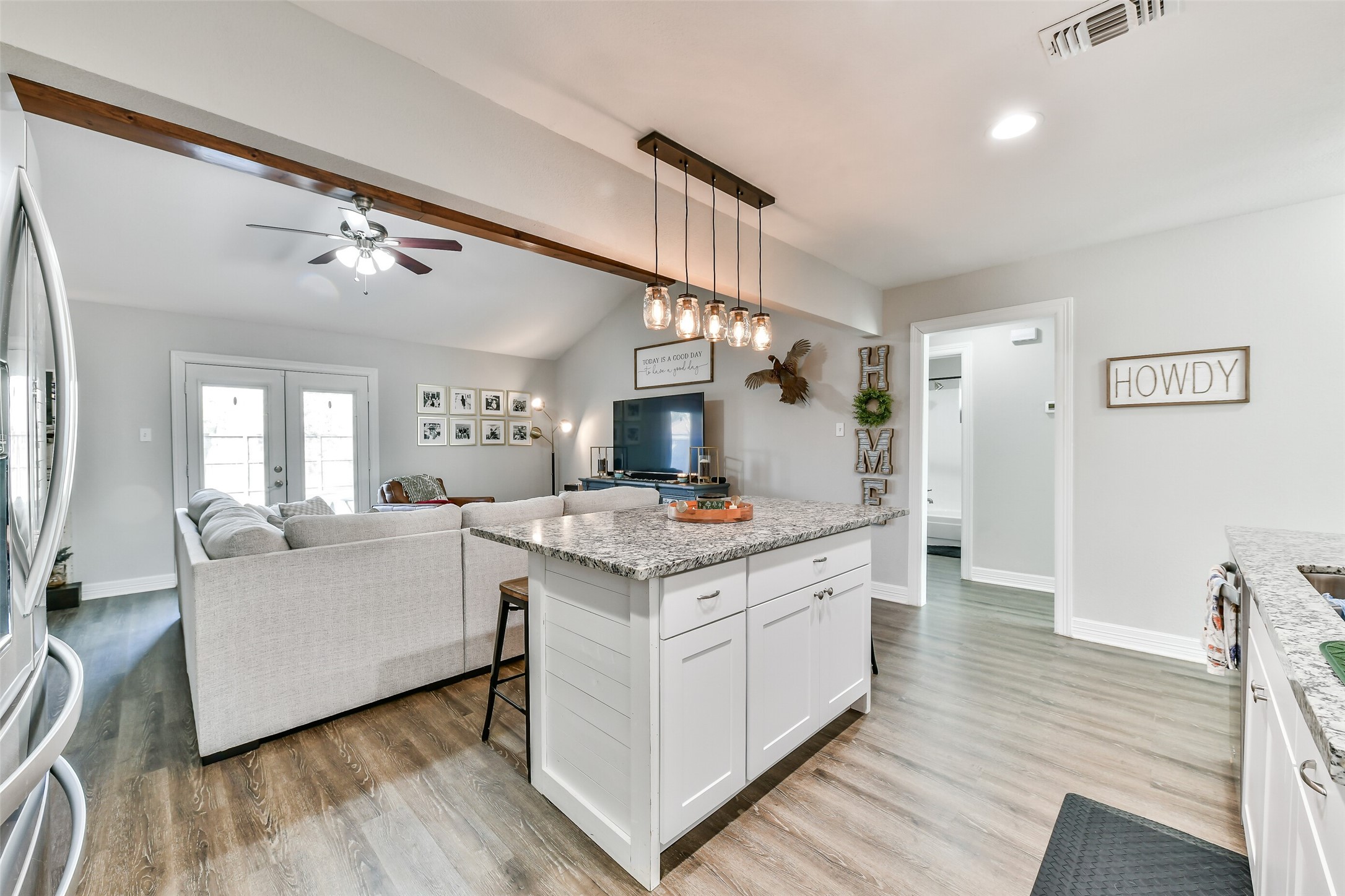 5421 Bramble Lane Dickinson, TX 77539 - Photo 10 of 26 a view of living room with granite countertop furniture and wooden floor