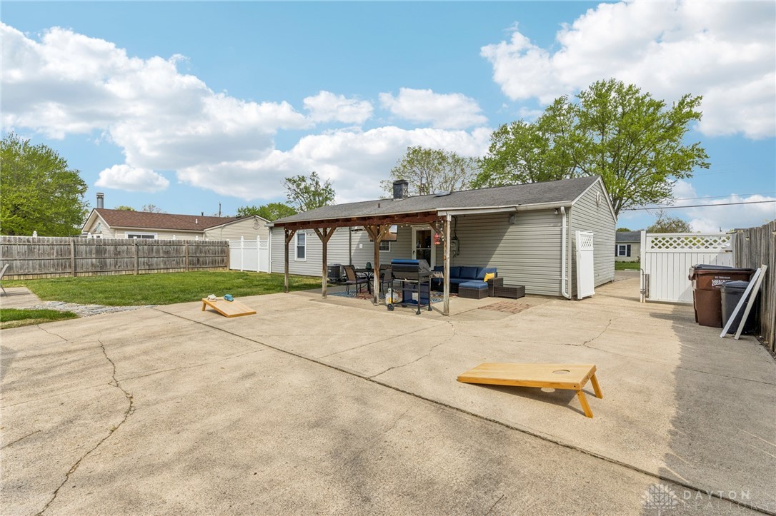 4934 Castleton Drive Fairfield, OH 45014 - Photo 30 of 36 This property features an inviting backyard with a covered patio for outdoor gatherings.